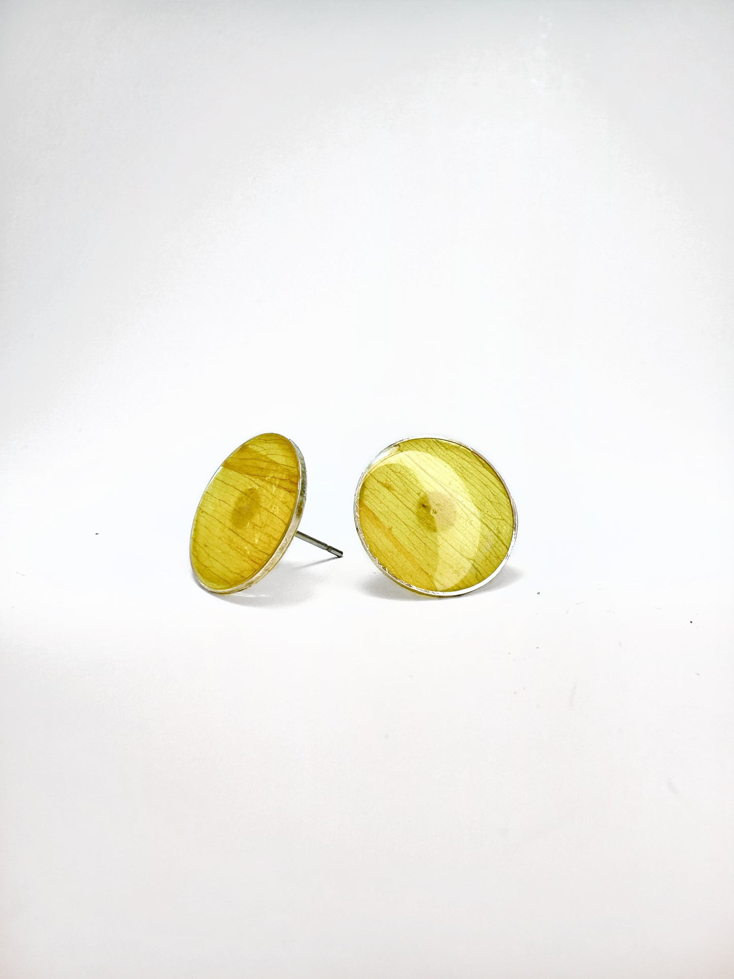Pair of circle studs made with real rudbeckia (brown eyed susan) flower petals in silver.