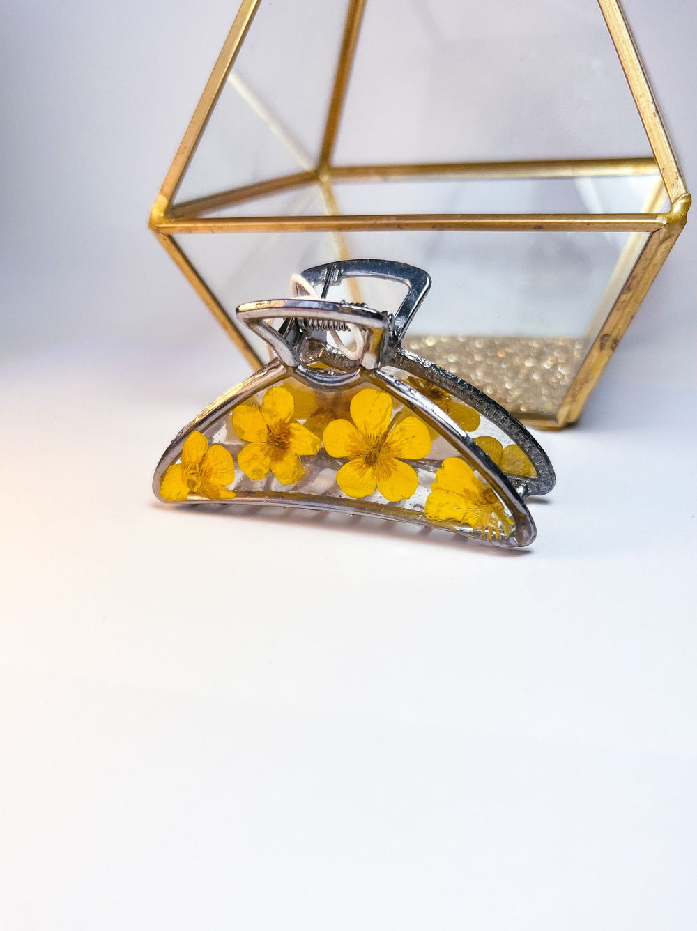 SIlver hair clip made with buttercups from Nova Scotia. 