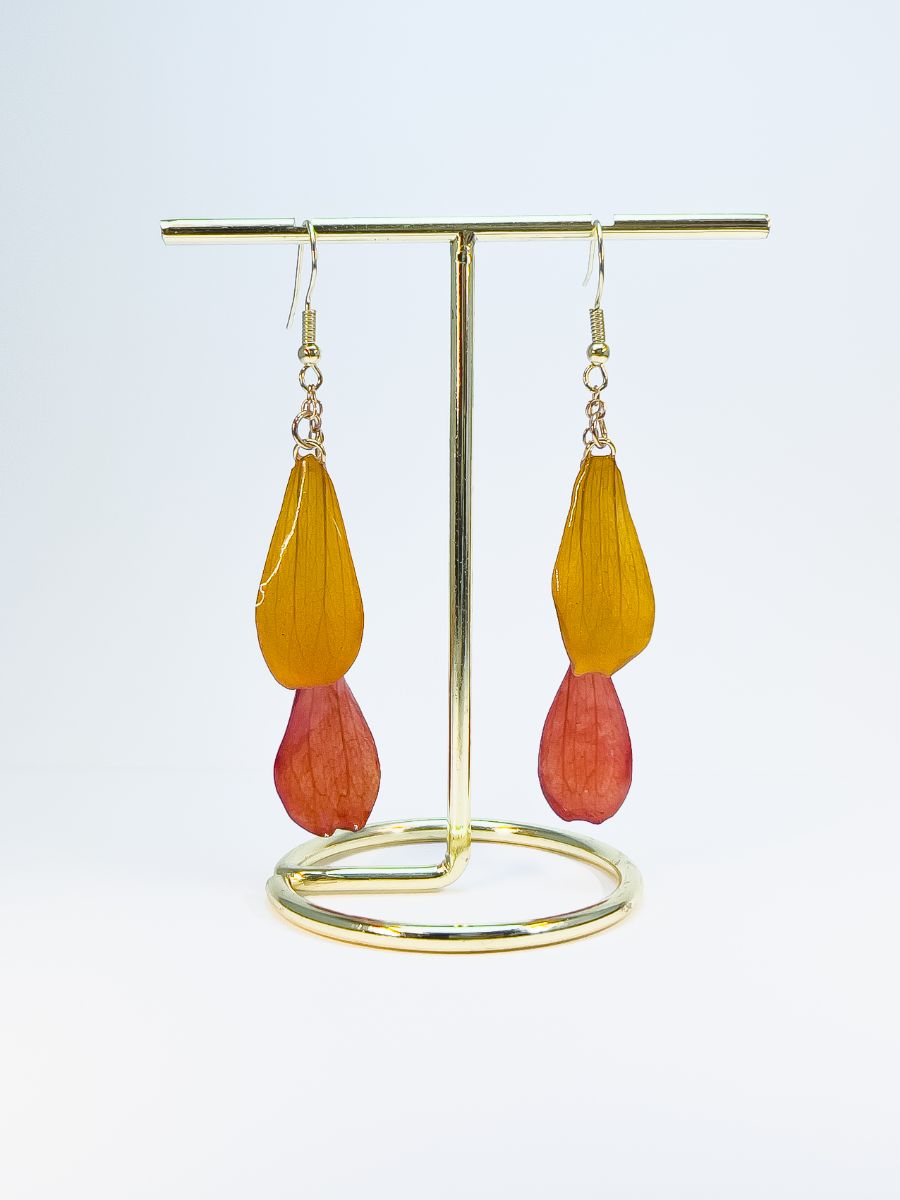 Earrings made from orange and red real zinnia petals. Two petals per earring.