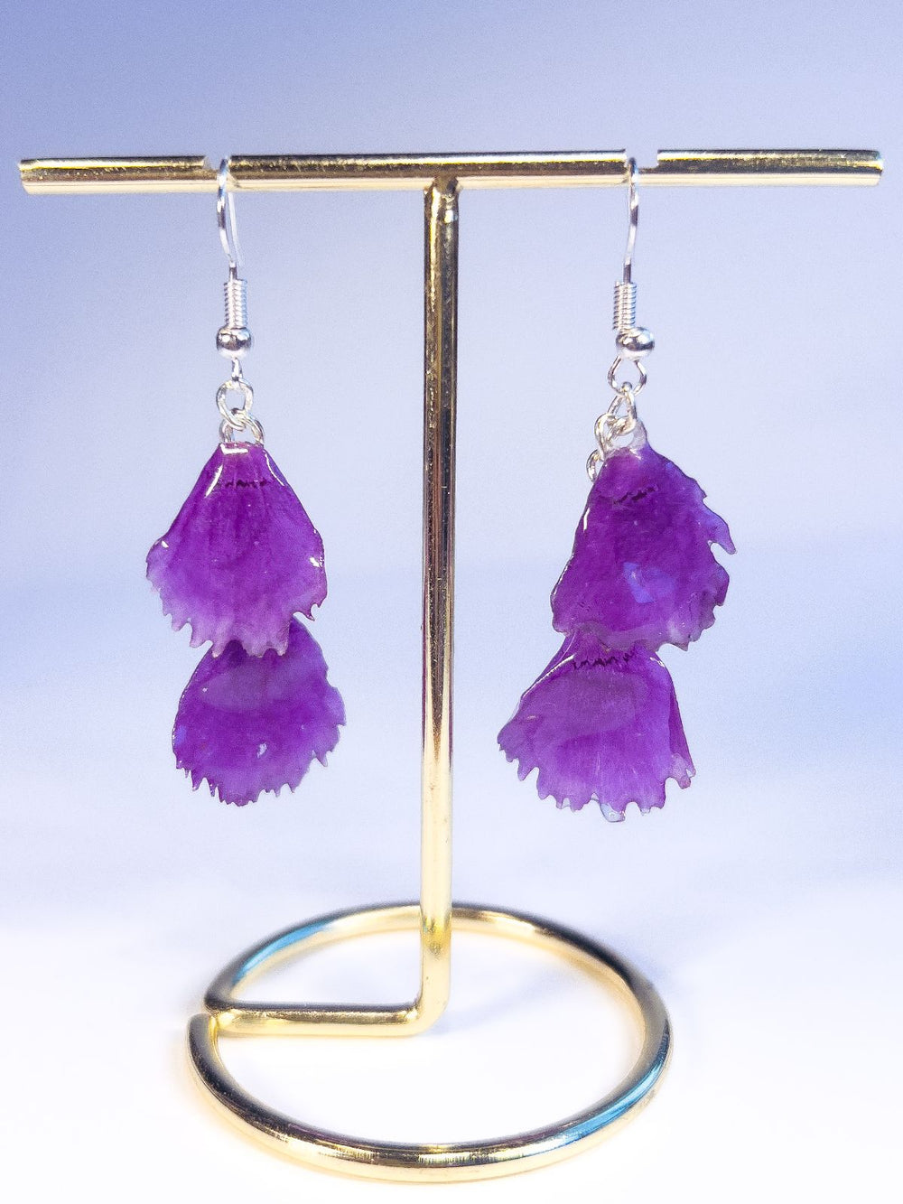 Silver metal earrings with two dianthus flower petals on each.
